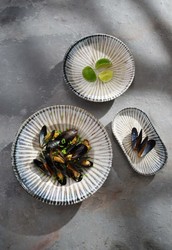 Zdjęcie do “Fine Dine Talerz owalny Ammonite 200x110 mm - kod 200278”.